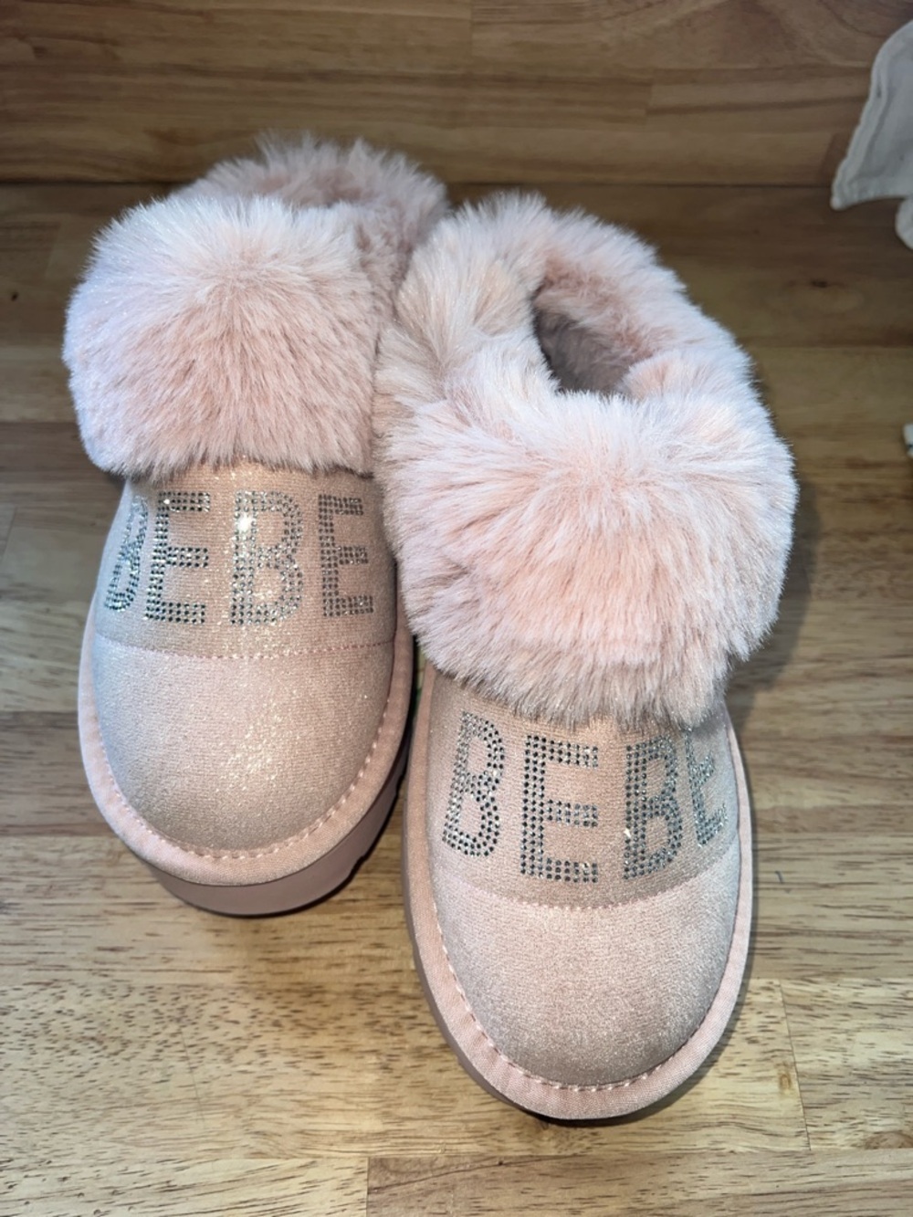 bebe Blush Pink Faux Fur Crystal Logo Slip-Ons